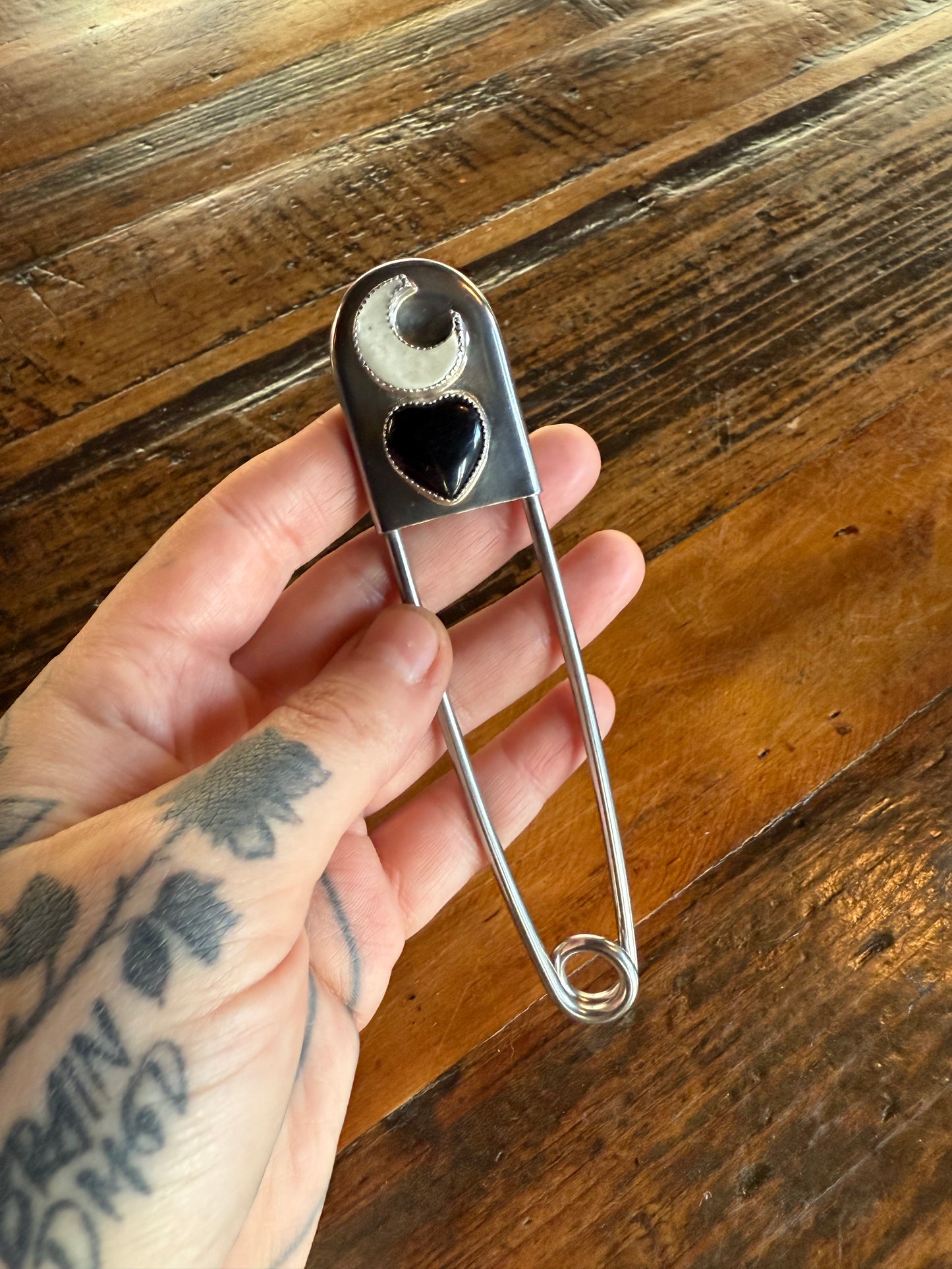 Sinner’s safety pin
